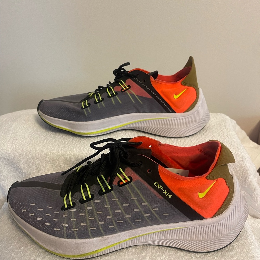 Nike Running shoes comfortable and supportive. Barely worn perfect condition!